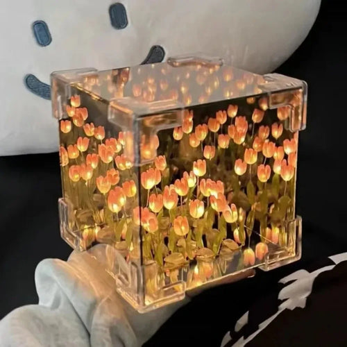 Creative Tulip Flower Sea Cube night light featuring illuminated orange tulips in a clear acrylic cube, creating a magical garden effect with warm glowing flowers suspended in a transparent display case, perfect for ambient lighting and decorative accent.