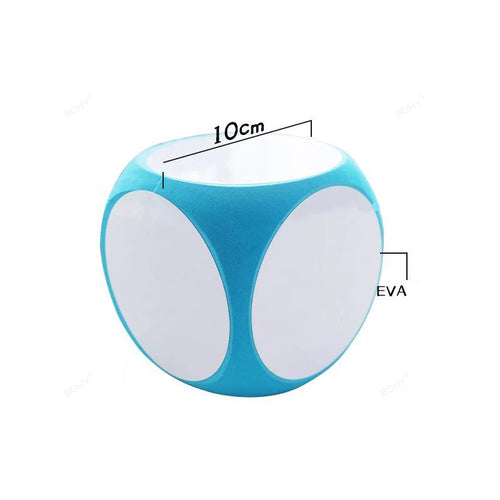 Blank Dice Write-On Cube featuring a turquoise and white 10cm EVA foam die with smooth writable surfaces on each face, displaying product dimensions and material specifications against a white background